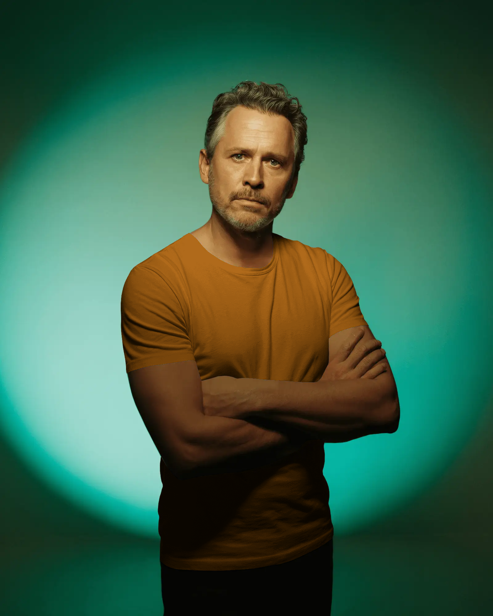 confident-male-t-shirt-mockup-mature-man-posing-with-crossed-arms-in-studio-colored-light-02557(2)