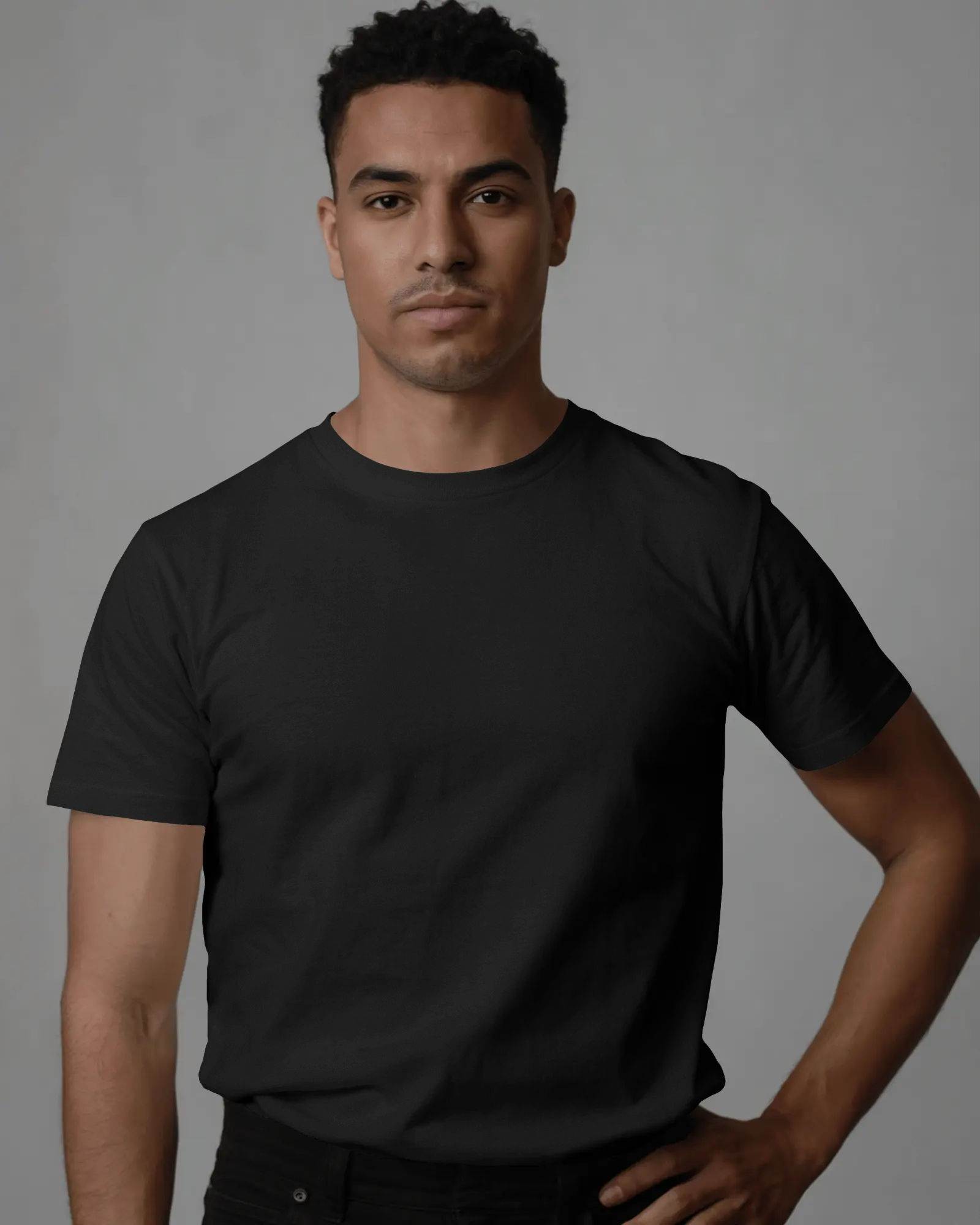 modern-fit-t-shirt-mockup-male-model-front-view-hand-on-hip-against-soft-light-background-02357