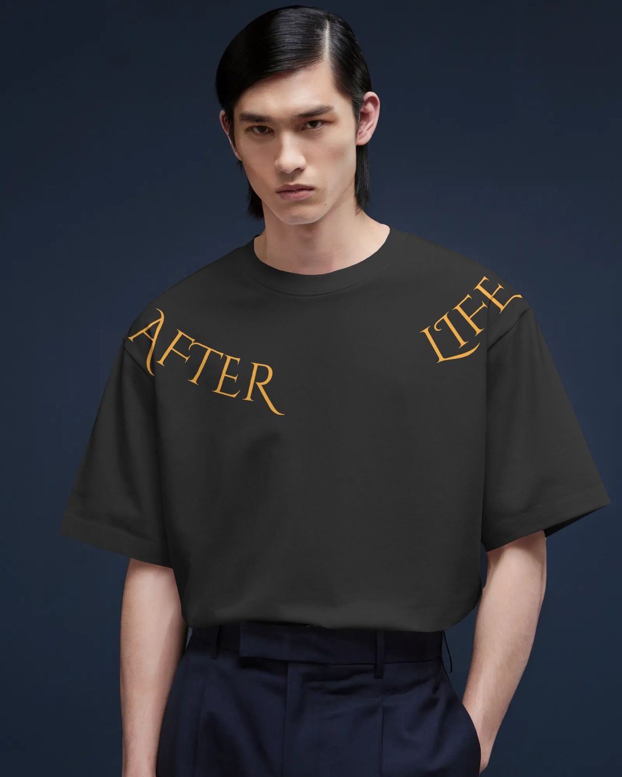 studio-lit-tshirt-mockup-male-model-facing-front-in-clean-minimal-navy-background-modern-and-sleek-style-01785 (1) Graphic Printed T-Shirt